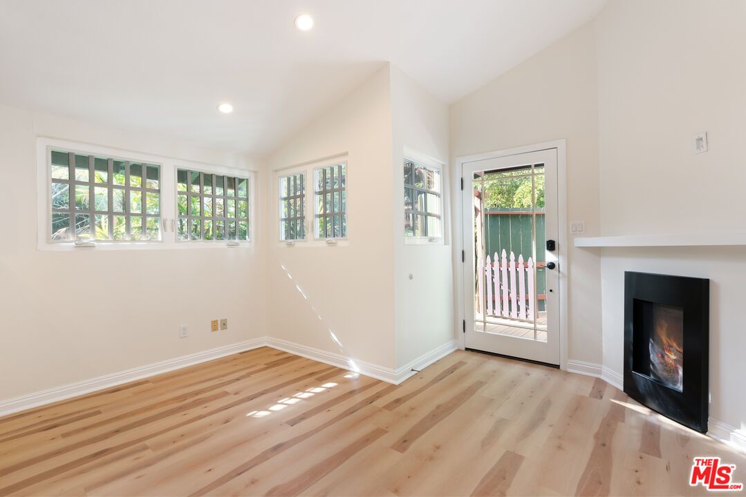Empty room, Fireplace, Interior, Recessed Lighting, Wood Texture Flooring