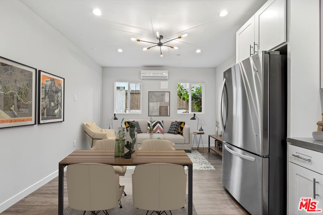 Dining room, Interior, Kitchen, Living room, Pendant Lights, Recessed Lighting, Stainless Steel Appliances, Wood Texture Flooring