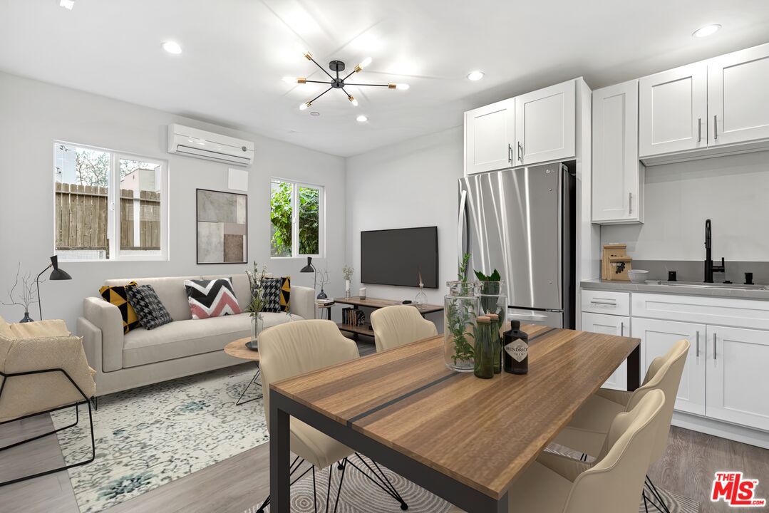 Dining room, Interior, Kitchen, Living room, Recessed Lighting, Stainless Steel Appliances, Wood Texture Flooring