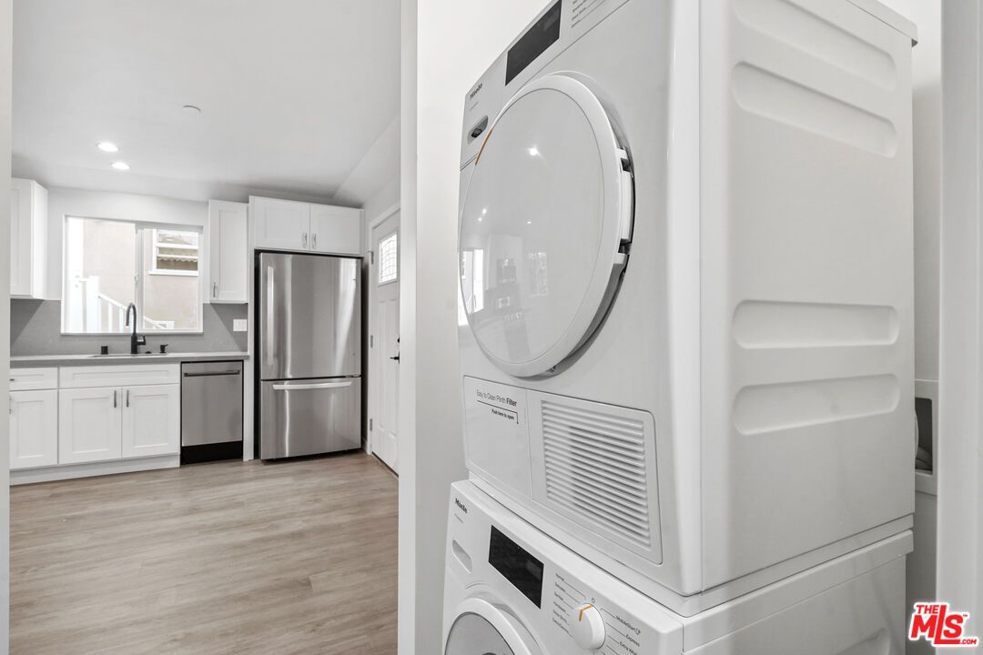 Interior, Kitchen, Recessed Lighting, Utility Closets, Washer, Wood Texture Flooring