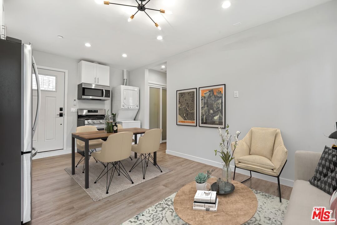 Dining room, Interior, Kitchen, Recessed Lighting, Stainless Steel Appliances, Wood Texture Flooring