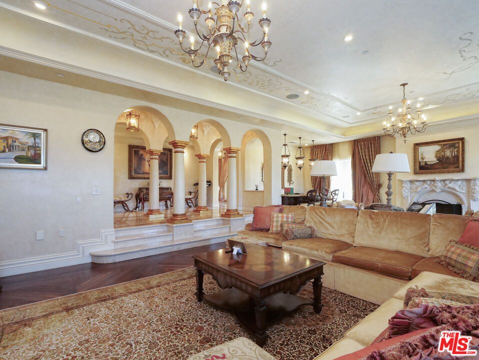 Chandelier, Fireplace, Interior, Living room, Recessed Lighting, Wood Texture Flooring