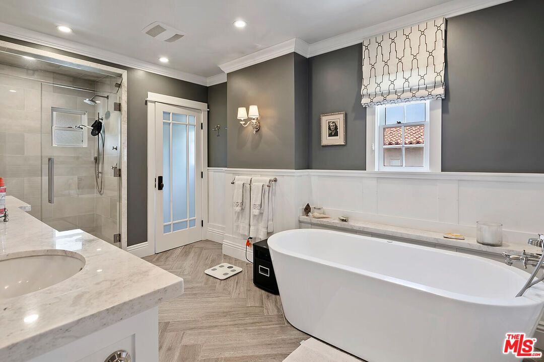 Bathroom, Dual Sink Vanities, Free Standing Baths, Glass Shower, Interior, Recessed Lighting, Wood Texture Flooring