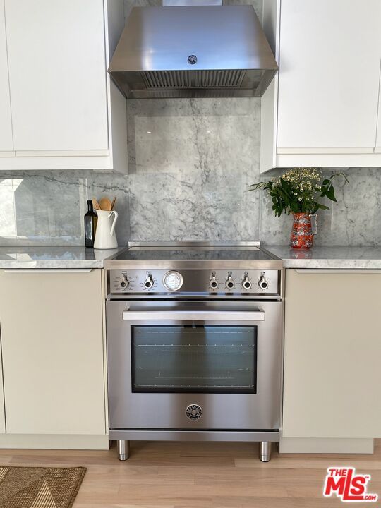 Interior, Kitchen, Marble Walls, Stainless Steel Appliances, Wood Texture Flooring