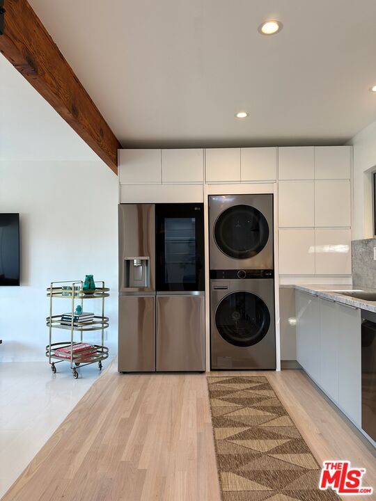 Interior, Recessed Lighting, Stainless Steel Appliances, Washer, Wood Texture Flooring
