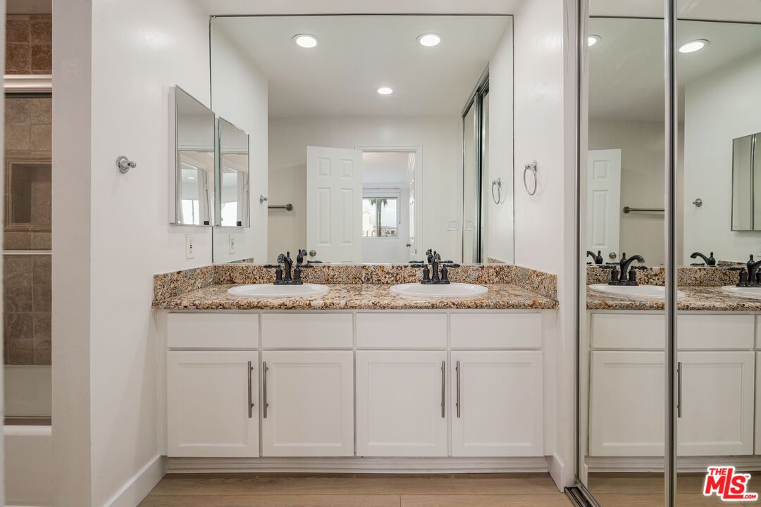 Bathroom, Dual Sink Vanities, Interior, Recessed Lighting, Wood Texture Flooring