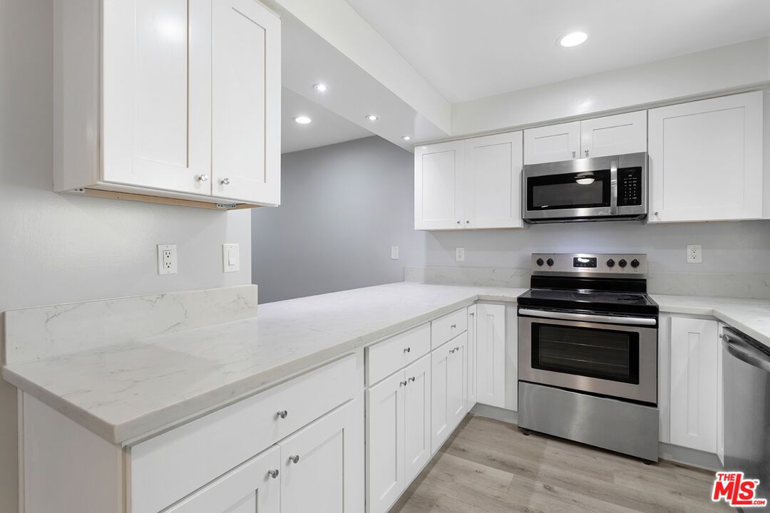 Interior, Kitchen, Recessed Lighting, Stainless Steel Appliances, Wood Texture Flooring