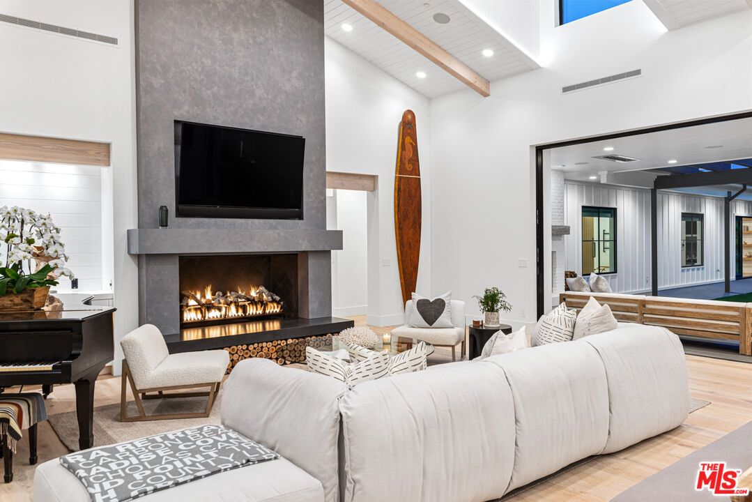 Fireplace, Interior, Living room, Piano, Recessed Lighting, Wooden Beams, Wood Texture Flooring