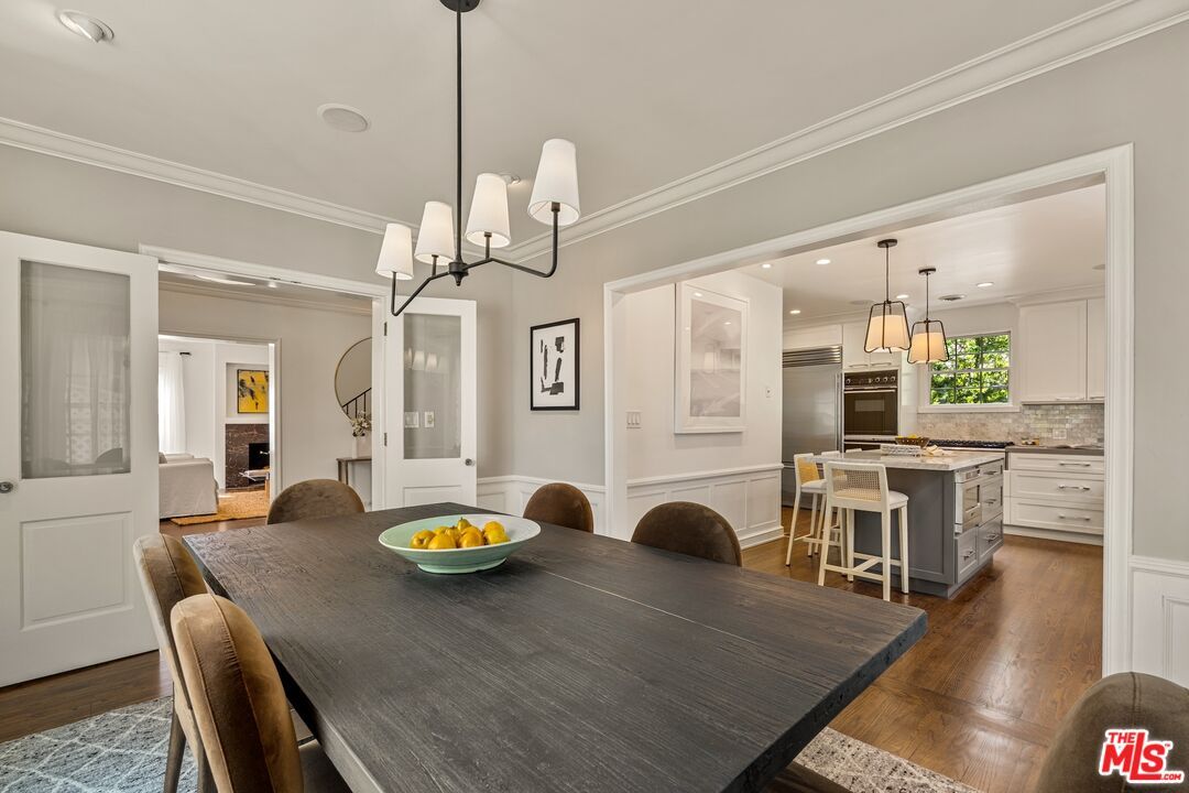 Chandelier, Dining room, Interior, Kitchen, Pendant Lights, Recessed Lighting, Stainless Steel Appliances, Wood Texture Flooring