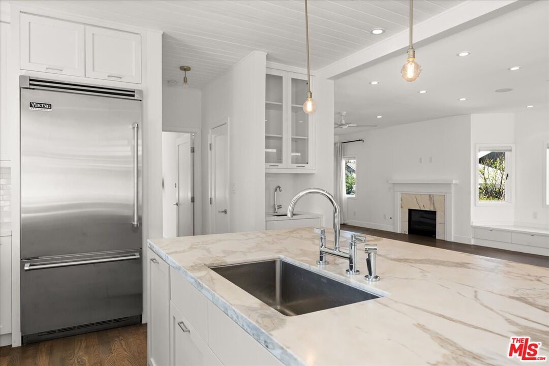Fireplace, Interior, Kitchen, Pendant Lights, Recessed Lighting, Stainless Steel Appliances, Wood Texture Flooring