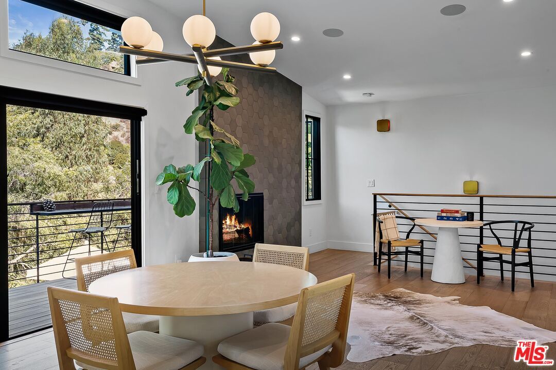 Dining room, Fireplace, Interior, Pendant Lights, Recessed Lighting, Wood Texture Flooring