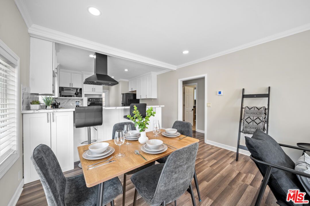 Dining room, Interior, Kitchen, Recessed Lighting, Stainless Steel Appliances, Wood Texture Flooring