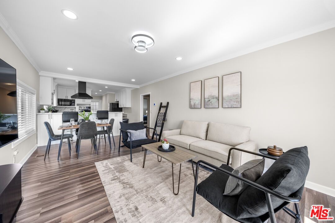 Dining room, Interior, Kitchen, Living room, Recessed Lighting, Stainless Steel Appliances, Wood Texture Flooring