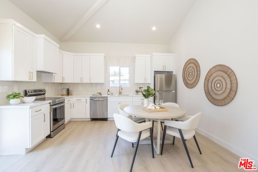 Dining room, Interior, Kitchen, Recessed Lighting, Stainless Steel Appliances, Wood Texture Flooring