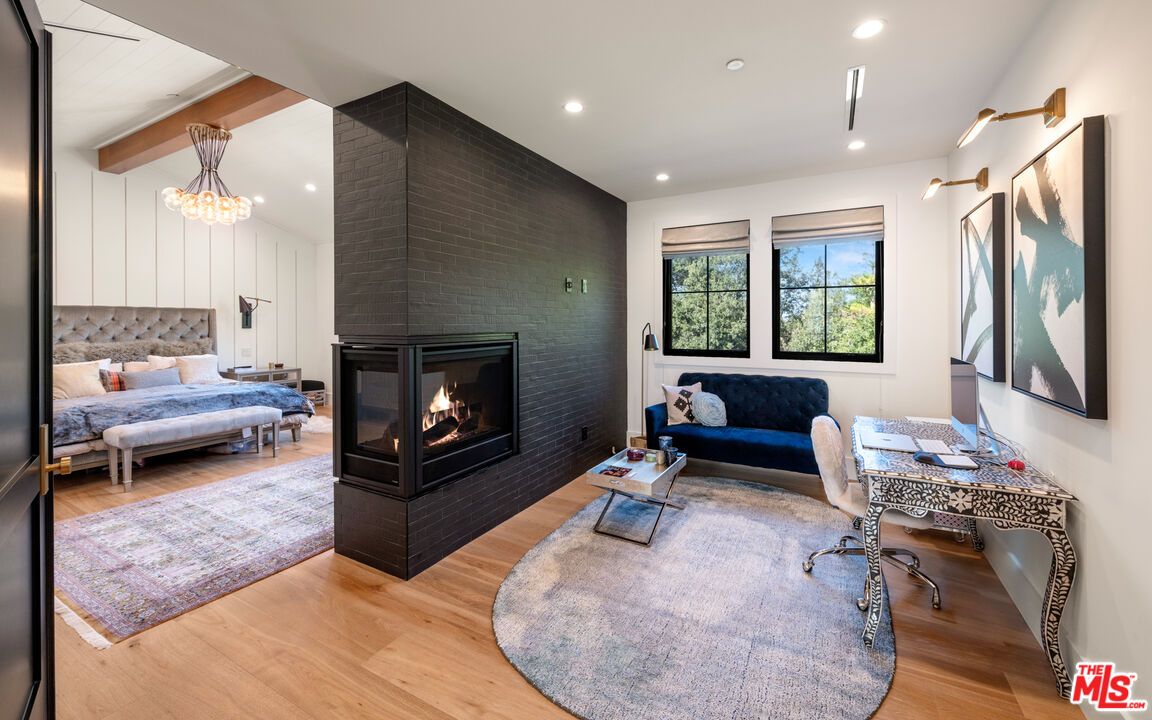 Bedroom, Fireplace, Interior, Pendant Lights, Recessed Lighting, Wood Texture Flooring