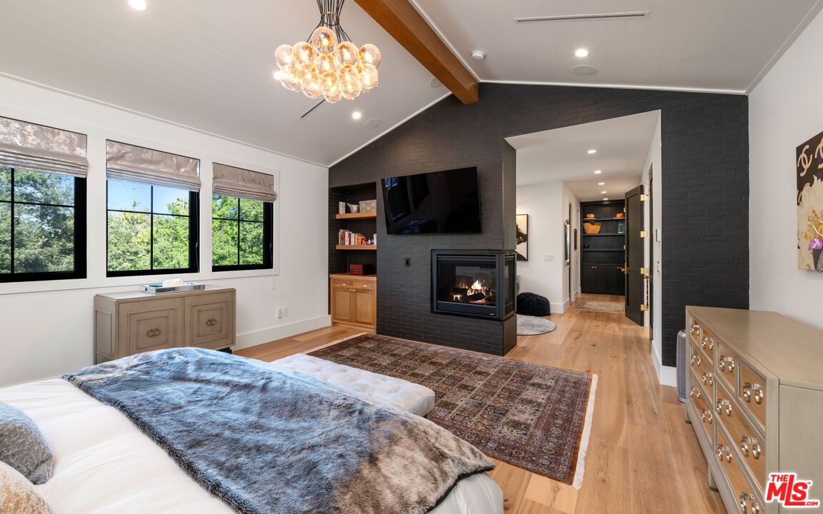 Bedroom, Fireplace, Interior, Pendant Lights, Recessed Lighting, Wood Texture Flooring