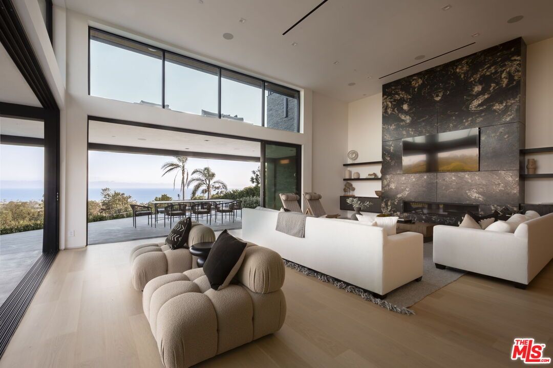 Fireplace, Interior, Living room, Recessed Lighting, Water, Wood Texture Flooring