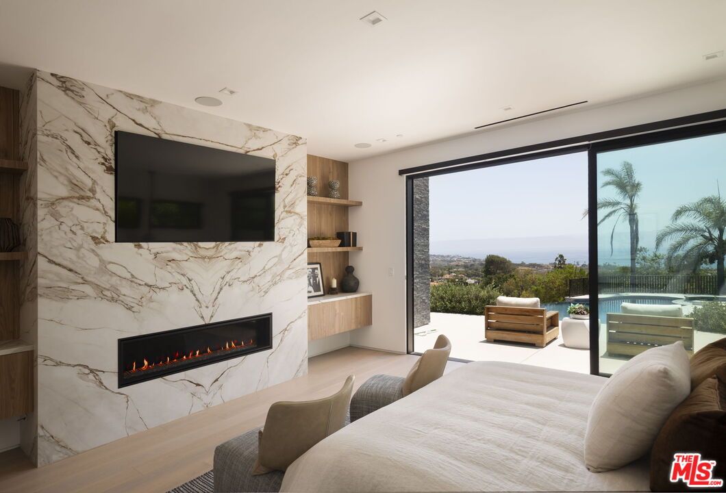 Bedroom, Fireplace, Interior, Marble Walls, Recessed Lighting, Water