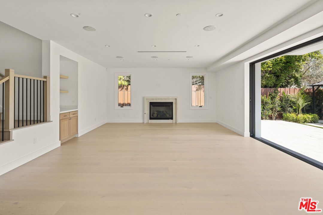Empty room, Fireplace, Interior, Recessed Lighting, Wood Texture Flooring
