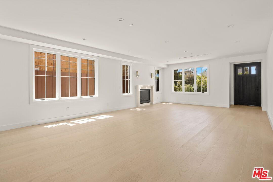 Empty room, Fireplace, Interior, Recessed Lighting, Wood Texture Flooring