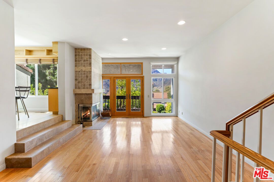 Empty room, Fireplace, Interior, Recessed Lighting, Wood Texture Flooring