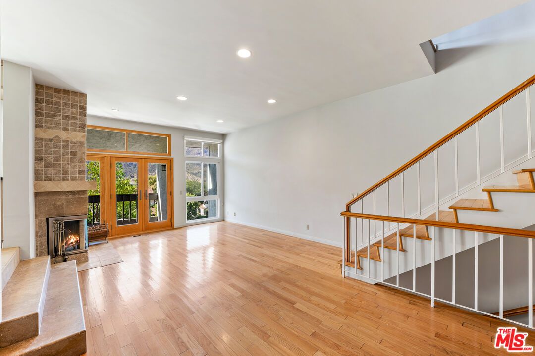Empty room, Fireplace, Interior, Recessed Lighting, Wood Texture Flooring