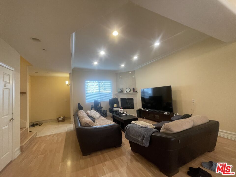 Fireplace, Interior, Living room, Recessed Lighting, Wood Texture Flooring