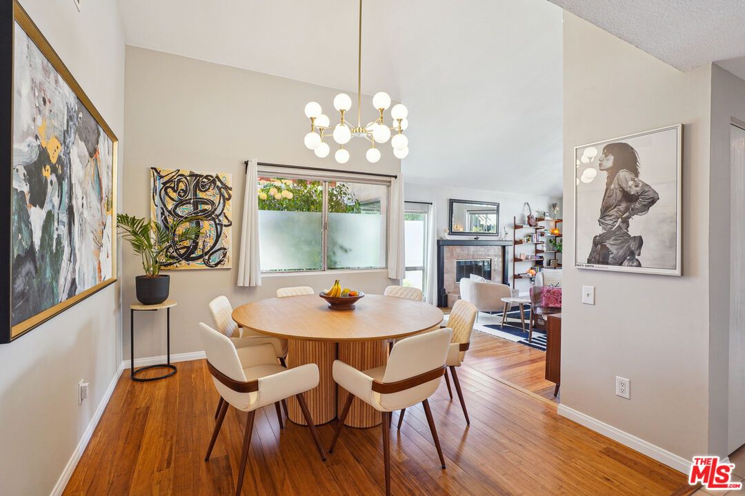 Dining room, Fireplace, Interior, Pendant Lights, Wood Texture Flooring