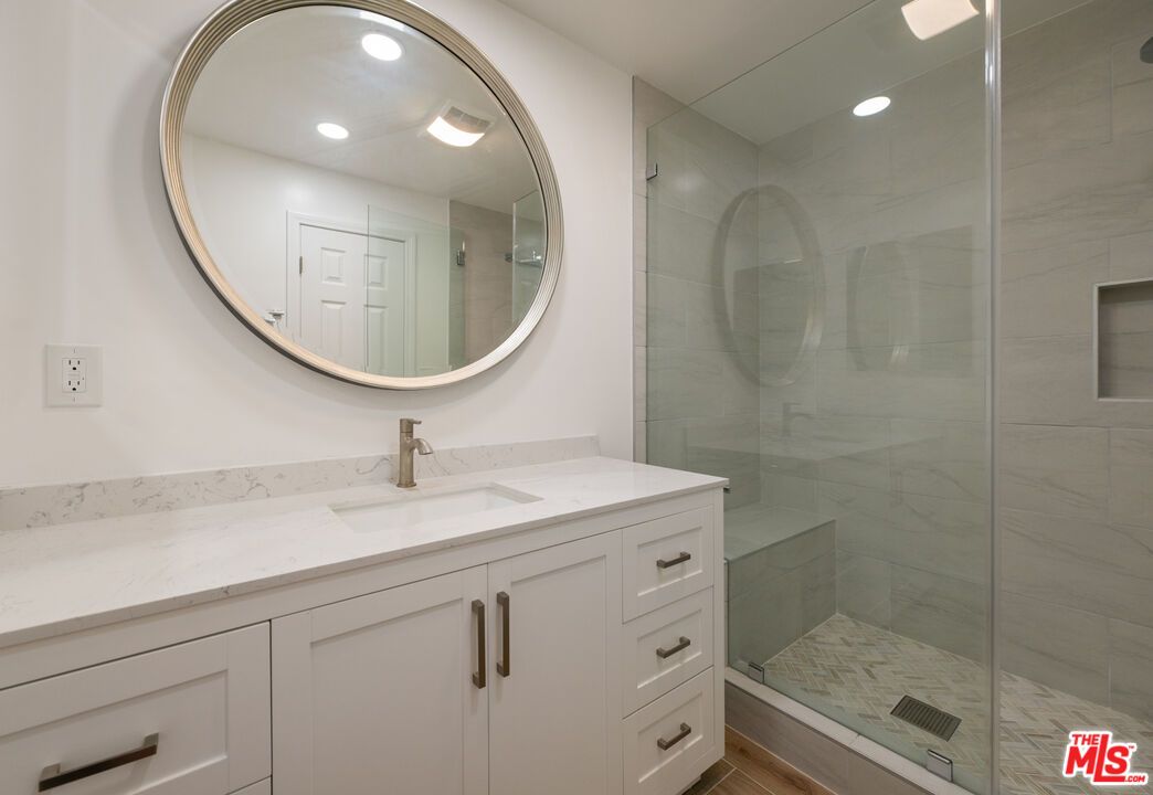 Bathroom, Glass Shower, Interior, Marble Walls, Recessed Lighting, Wood Texture Flooring