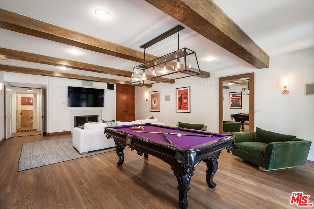 Billiard Table, Fireplace, Game Room, Interior, Pendant Lights, Recessed Lighting, Wooden Beams, Wood Texture Flooring