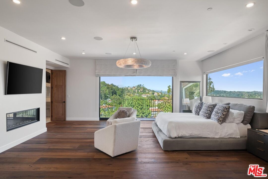 Bedroom, Fireplace, Interior, Pendant Lights, Recessed Lighting, Wood Texture Flooring
