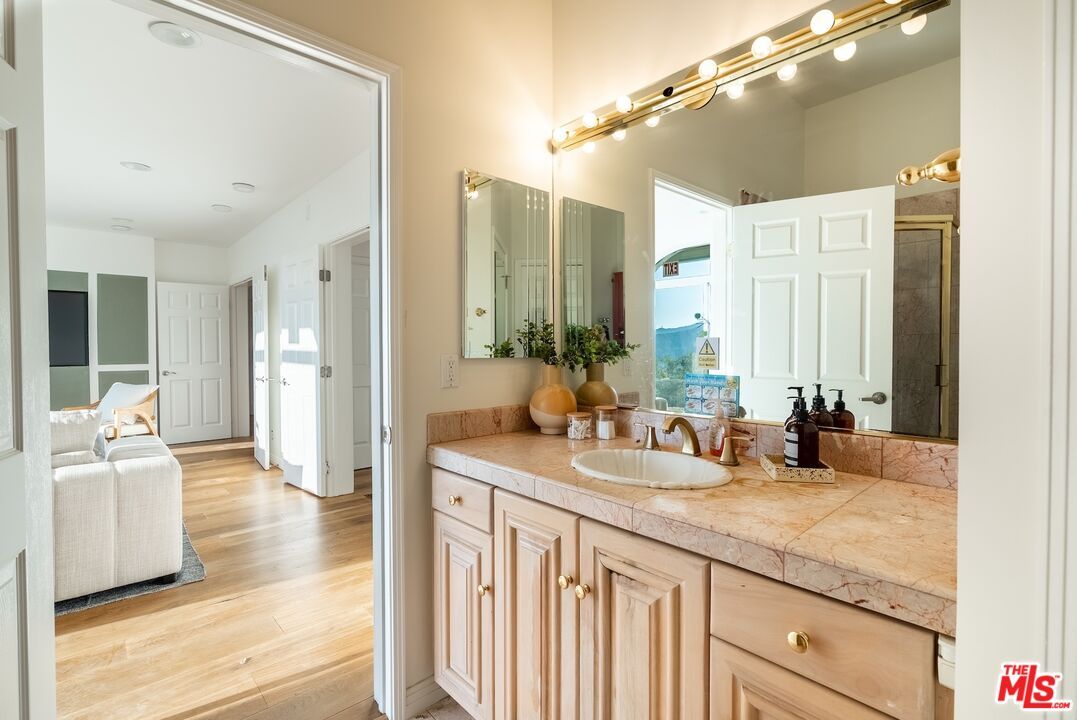 Bathroom, Dual Sink Vanities, Interior, Tile Countertops, Wood Texture Flooring