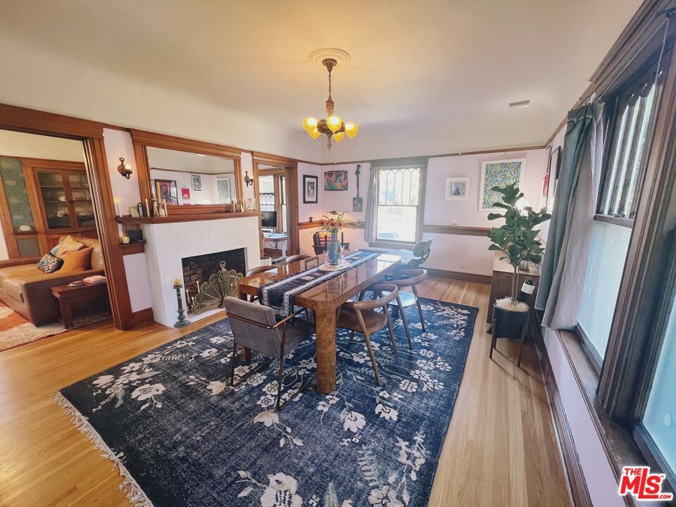 Chandelier, Dining room, Fireplace, Interior, Wood Texture Flooring