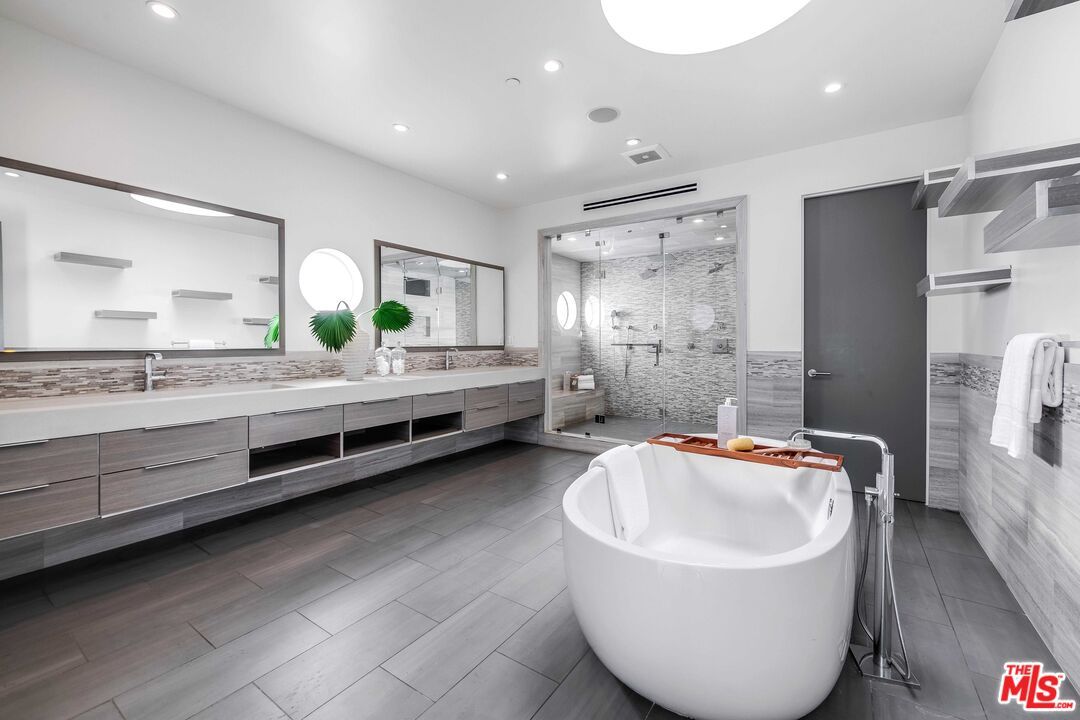 Bathroom, Dual Sink Vanities, Free Standing Baths, Glass Shower, Interior, Recessed Lighting, Wood Texture Flooring
