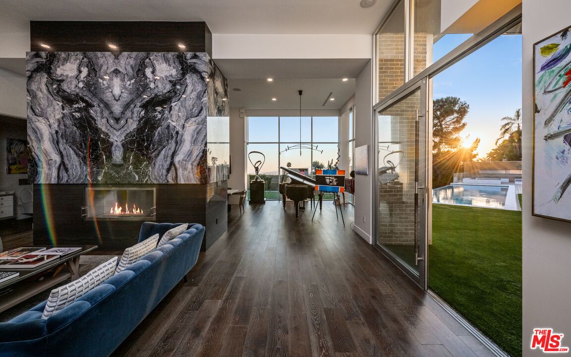 Dining room, Fireplace, Interior, Living room, Pendant Lights, Recessed Lighting, Wood Texture Flooring
