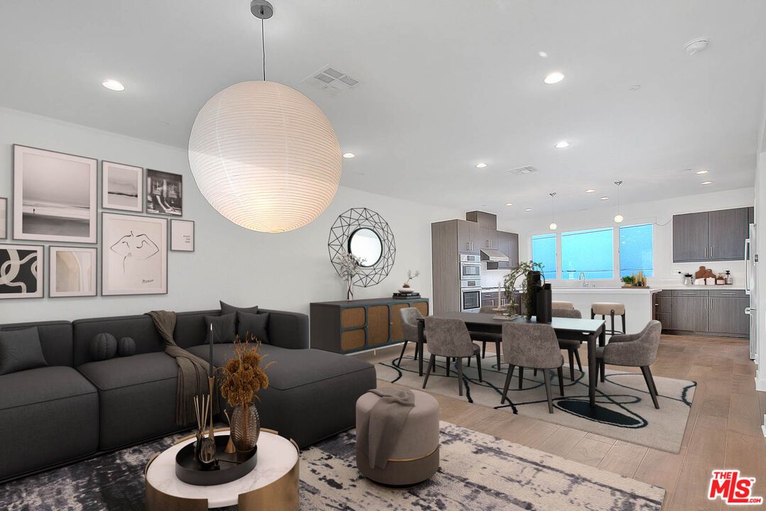 Dining room, Interior, Kitchen, Living room, Pendant Lights, Recessed Lighting, Stainless Steel Appliances, Wood Texture Flooring