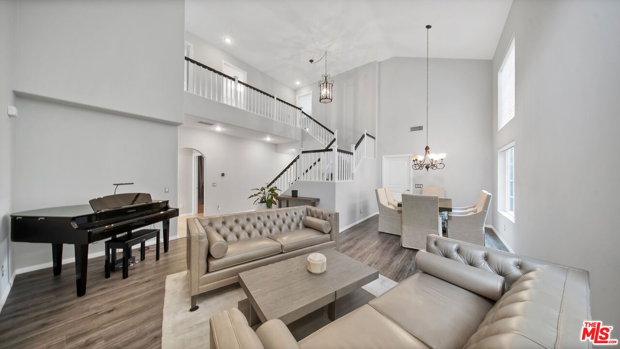 Chandelier, Dining room, Interior, Living room, Pendant Lights, Piano, Recessed Lighting, Wood Texture Flooring