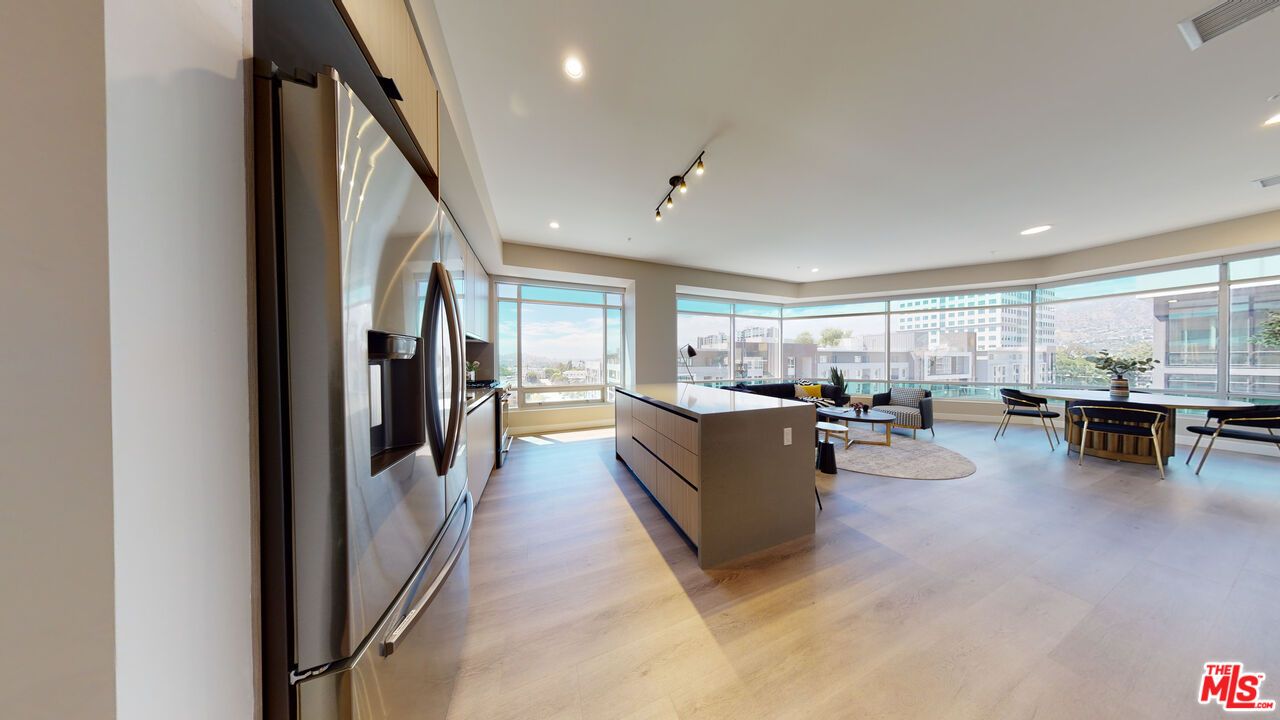 Dining room, Interior, Kitchen, Living room, Recessed Lighting, Stainless Steel Appliances, Wood Texture Flooring