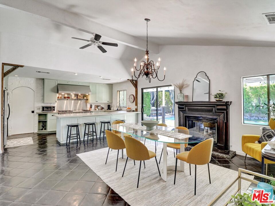 Chandelier, Dining room, Fireplace, Interior, Kitchen, Recessed Lighting, Stainless Steel Appliances