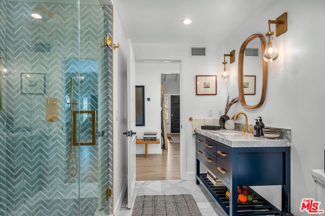 Bathroom, Dual Sink Vanities, Glass Shower, Interior, Recessed Lighting, Wood Texture Flooring