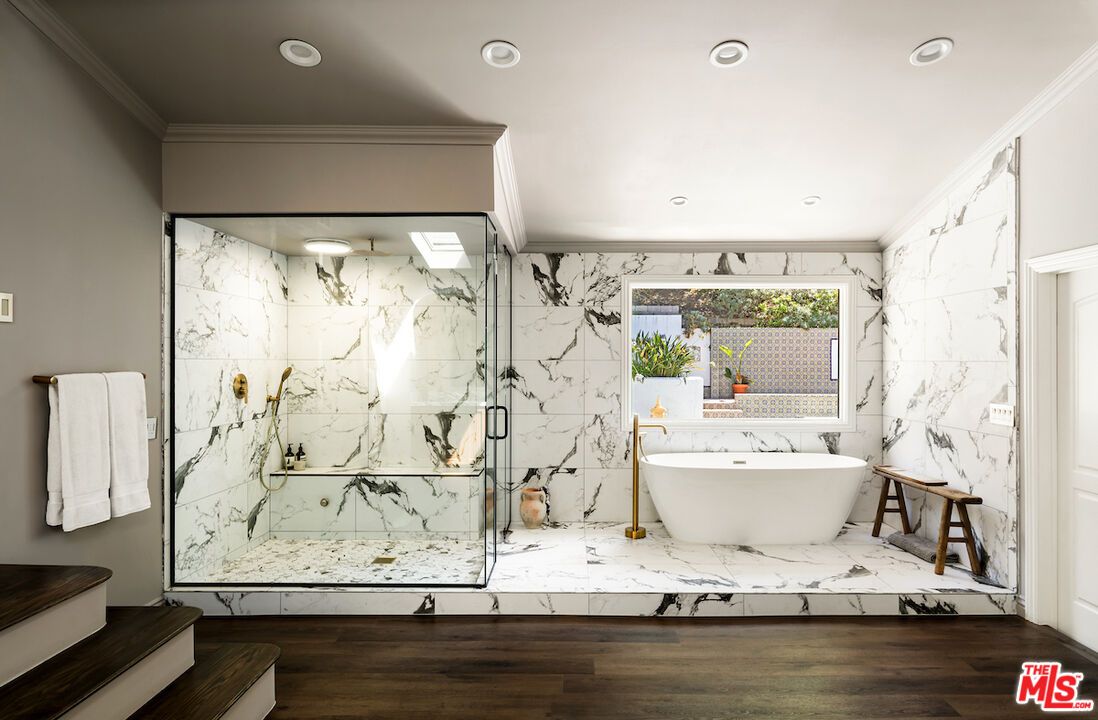 Bathroom, Free Standing Baths, Glass Shower, Interior, Marble, Marble Walls, Recessed Lighting, Wood Texture Flooring