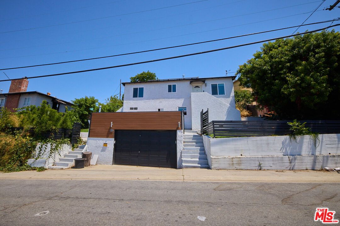 Attached, Exterior, Facade, Spanish Mediterranean