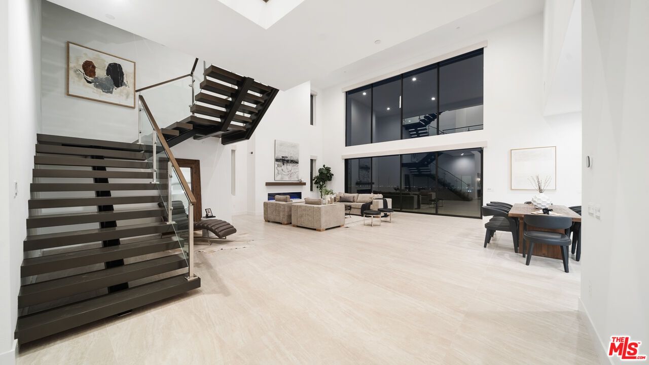 Dining room, Fireplace, Interior, Living room, Recessed Lighting, Wood Texture Flooring