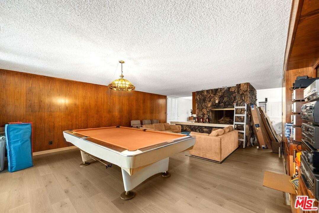 Billiard Table, Fireplace, Game Room, Interior, Living room, Wood Texture Flooring, Wooden Walls