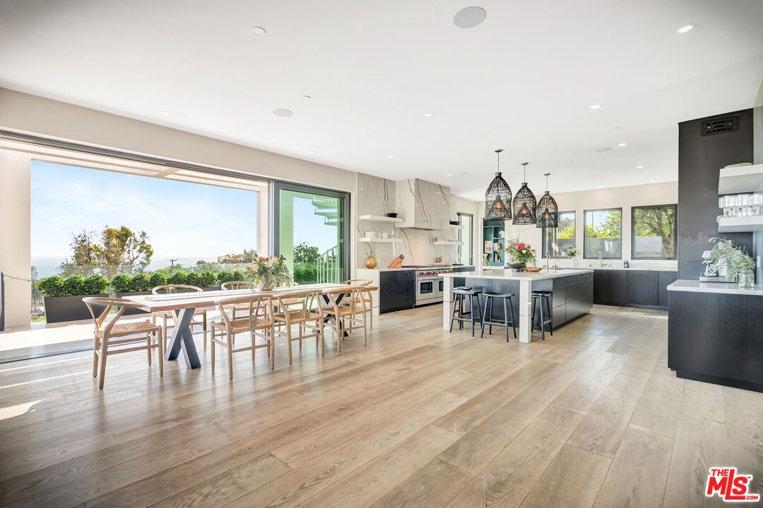 Dining room, Interior, Kitchen, Pendant Lights, Recessed Lighting, Stainless Steel Appliances, Wood Texture Flooring