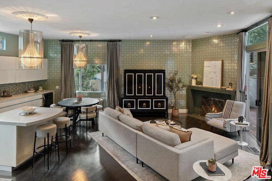 Dining room, Fireplace, Interior, Living room, Pendant Lights, Recessed Lighting, Wood Texture Flooring
