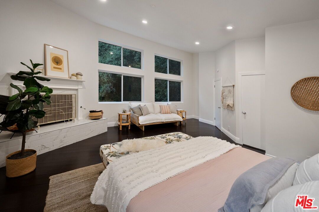 Bedroom, Fireplace, Interior, Recessed Lighting, Wood Texture Flooring