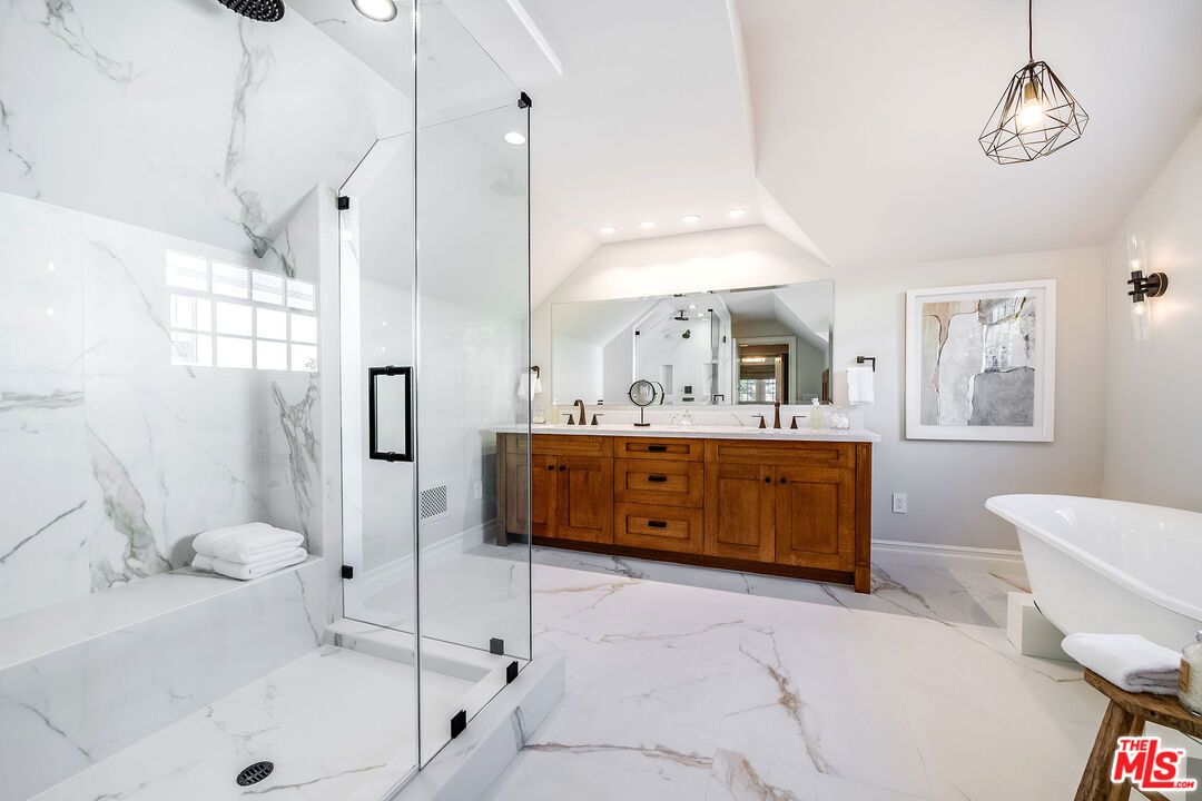 Bathroom, Dual Sink Vanities, Free Standing Baths, Glass Shower, Interior, Marble, Marble Walls, Pendant Lights, Recessed Lighting