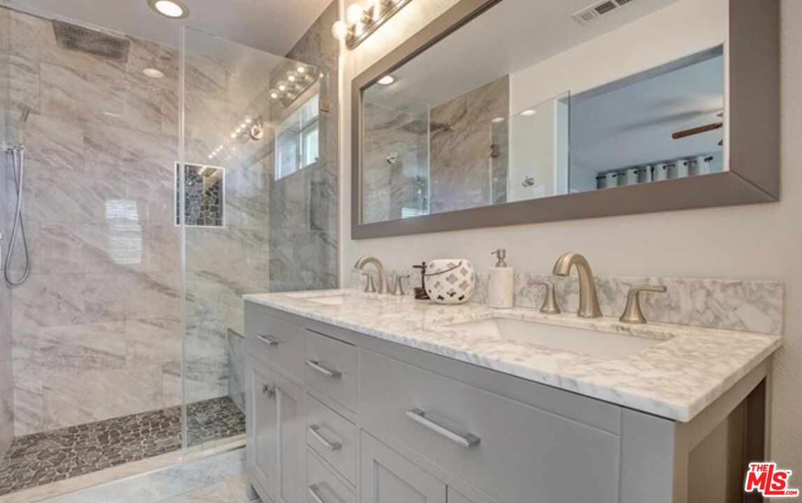 Bathroom, Dual Sink Vanities, Glass Shower, Interior, Marble Walls, Recessed Lighting