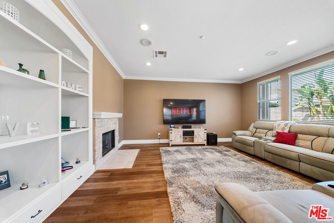 Fireplace, Interior, Living room, Recessed Lighting, Wood Texture Flooring